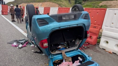 Woman killed, husband and two children injured in North-South Expressway crash